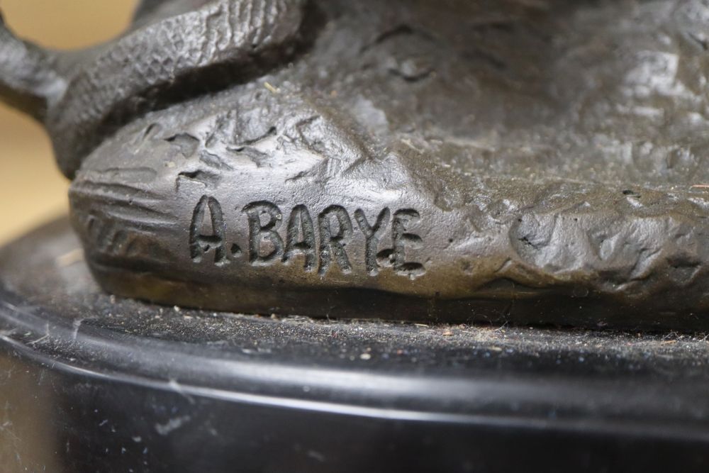 After A. Barye. A bronze of lion and a snake, height 24cm